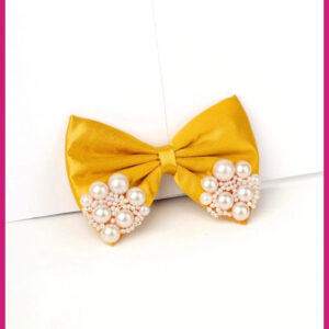 princess pearl bow, golden satin bow, pearl bow hair clip, yellow hair accessories, elegant pearl bow, satin hair bow with pearls, wedding hair accessories, party hair bow, stylish hair clip for women, pearl embellished bow, luxury golden bow, classy bow hair clip, chic satin hair bow, decorative pearl hair bow, Beautyshaj hair accessories, pearl bow for girls, fashion hair accessories online, golden pearl bow clip